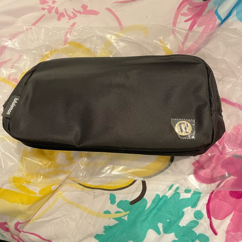 Lululemon black & gold everywhere beltbag